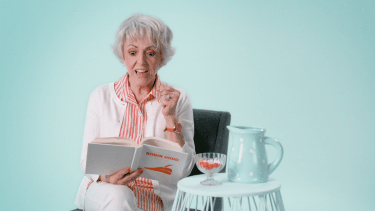 Shocked Senior While Reading A Book